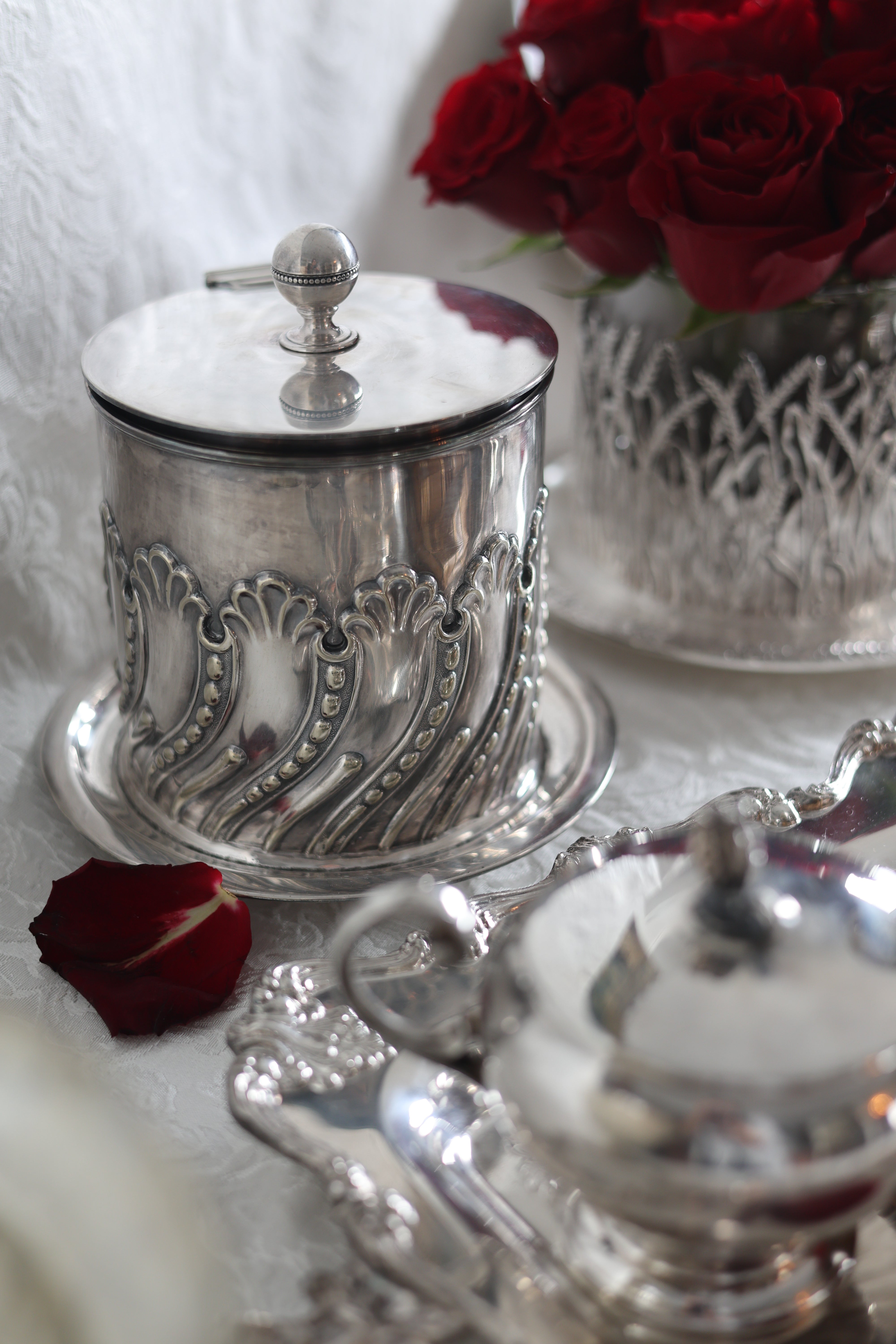 Biscuit Barrel with Repoussé Scroll Motif